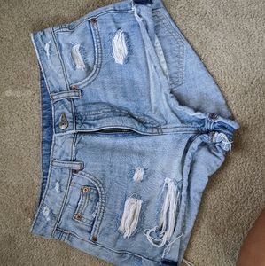 I wasted a light wash ripped jean shorts